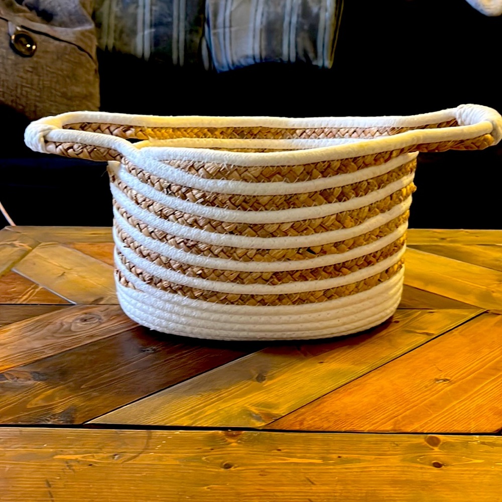White cotton and wicker, woven and stitched basket